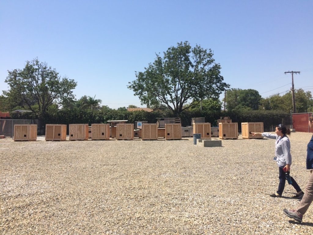 Cat shelters at UTC Aerospace Systems. These now have shade, thanks to a tarp donated by the Mary S. Roberts Clinic.