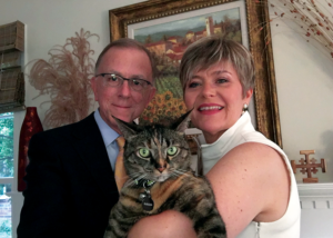 Ray Harry and Sheila Ward with their cat Alakazam.